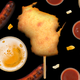 Illustration for article titled I crammed the entire state of Wisconsin into a corn dog